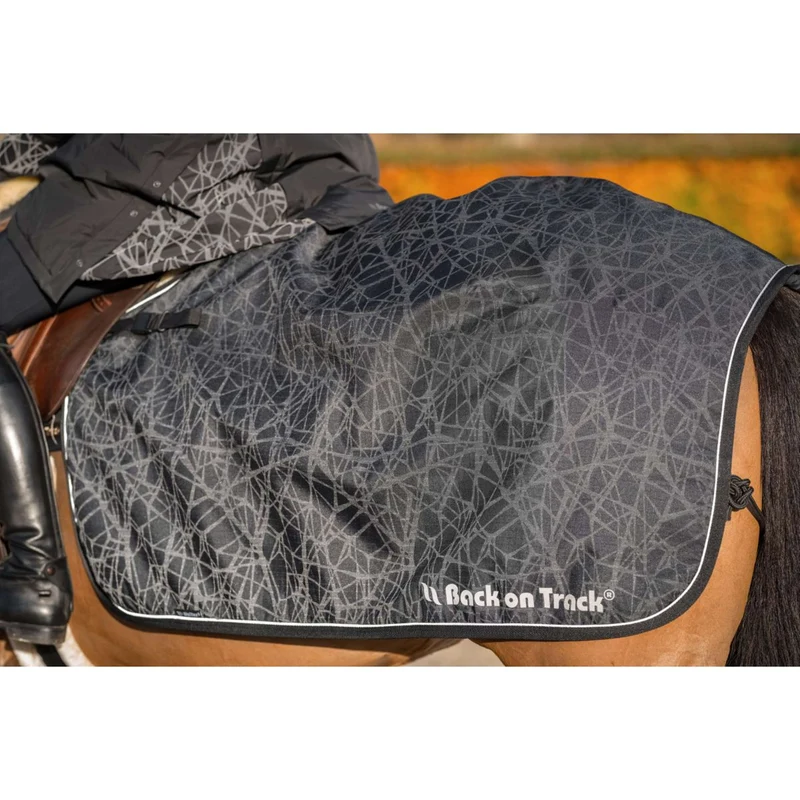 Back on Track Couvre-reins OUTTRAKK Réfléchissant Noir